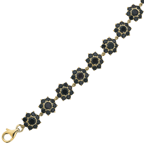 Armbandrosette aus vergoldetem Silber mit rundem Granat in der Mitte. Länge 17,5+2 cm.